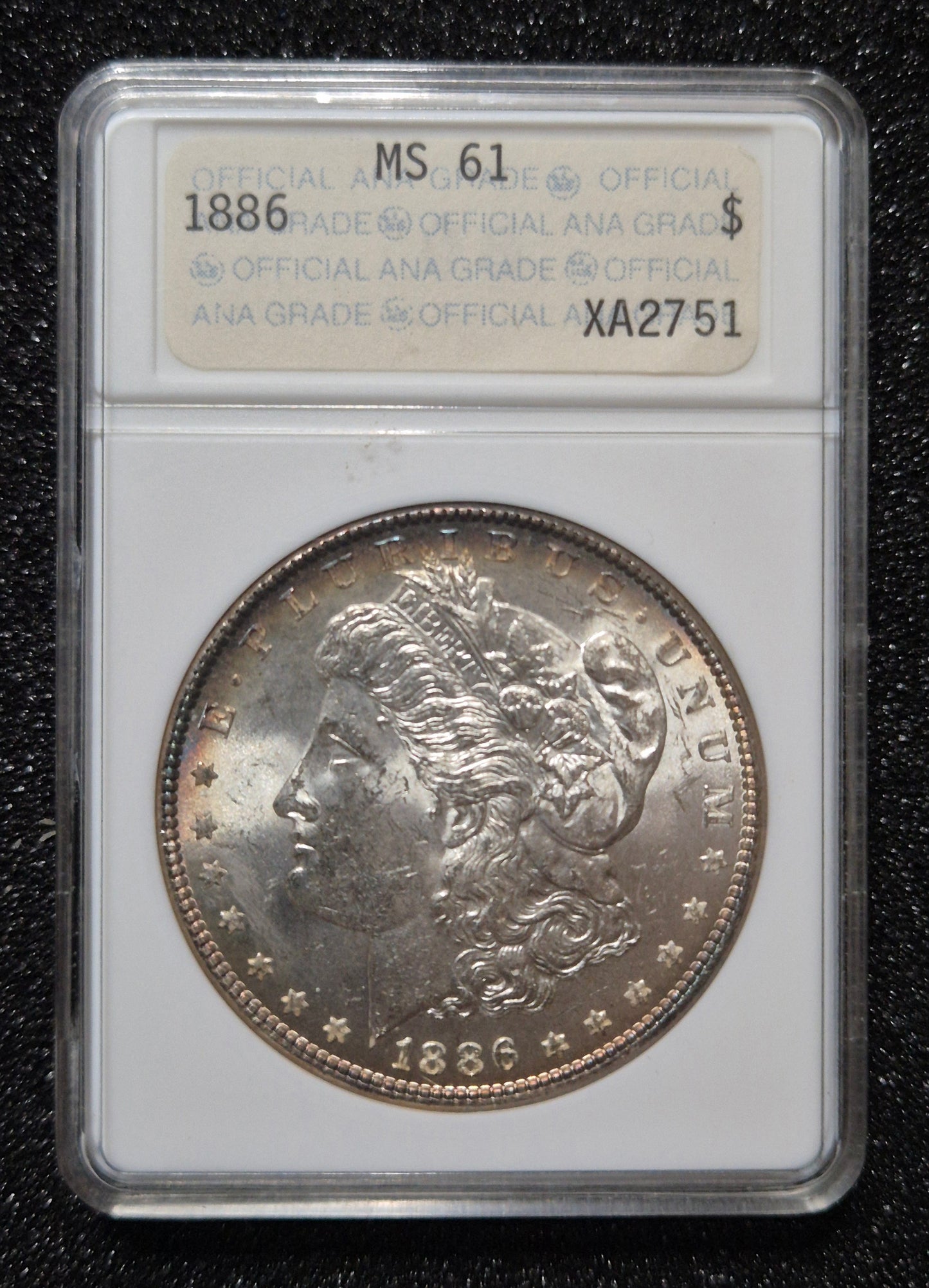 1886 Morgan Silver Dollar graded MS61 by the ANA Certification Service (note the older ANA soapbox slab).