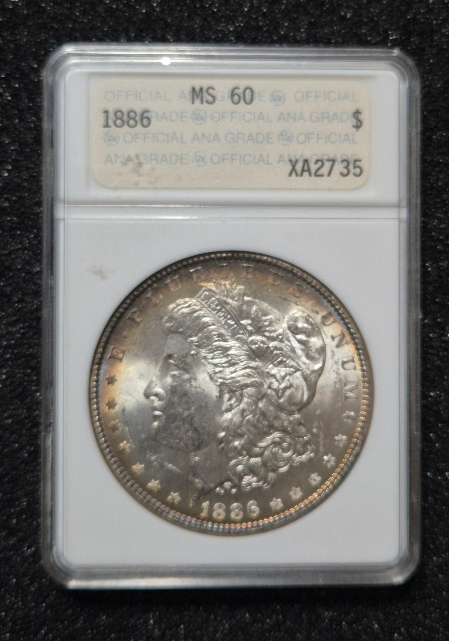 1886 Morgan Silver Dollar graded MS60 by the ANA Certification Service (note the older ANA soapbox slab).