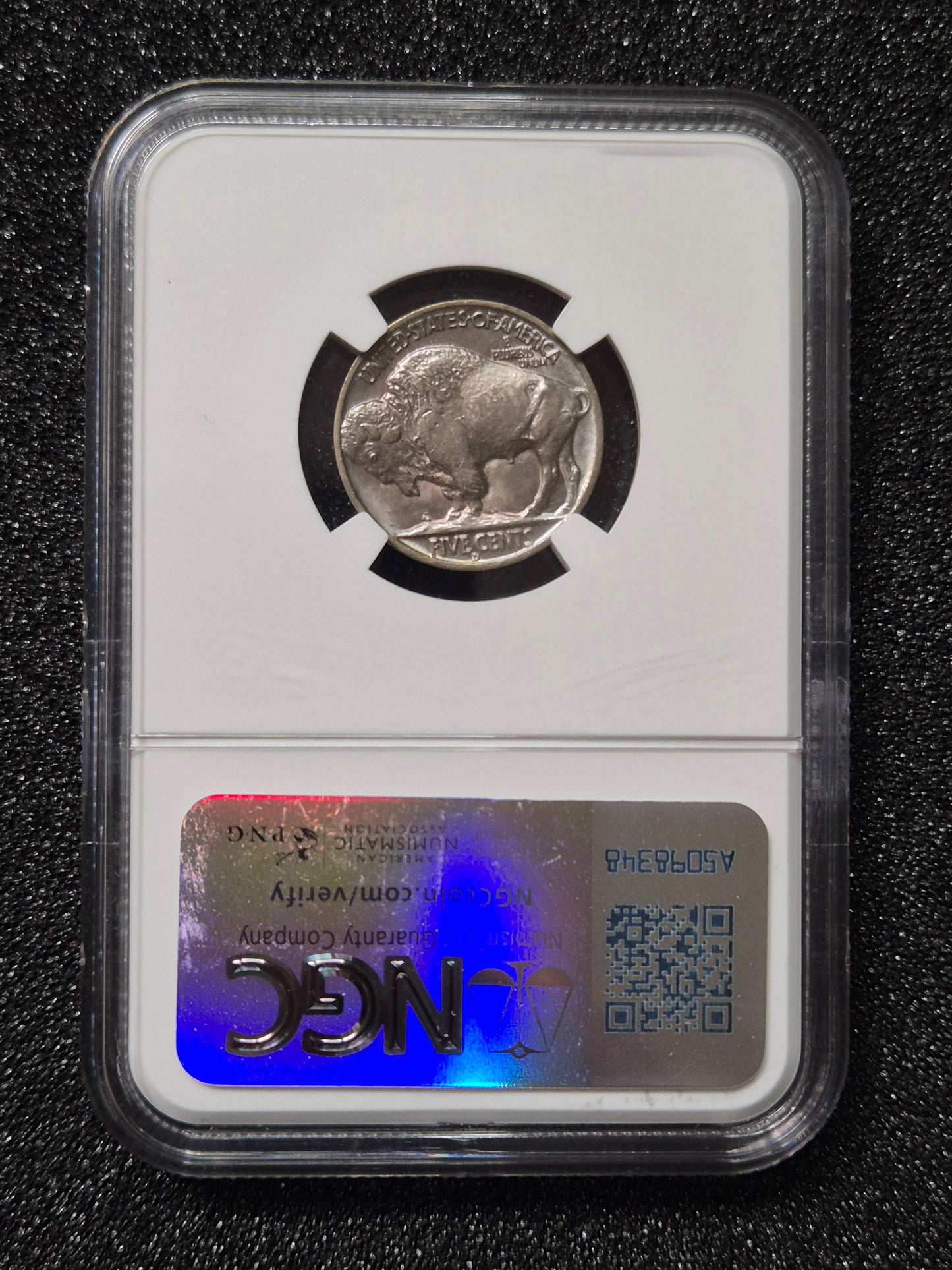1938-D Buffalo Nickel, MS66 by NGC and presented with a BullionPLUS “Original Bag Fragment” label that includes a small piece of an original U.S. Mint bag.
