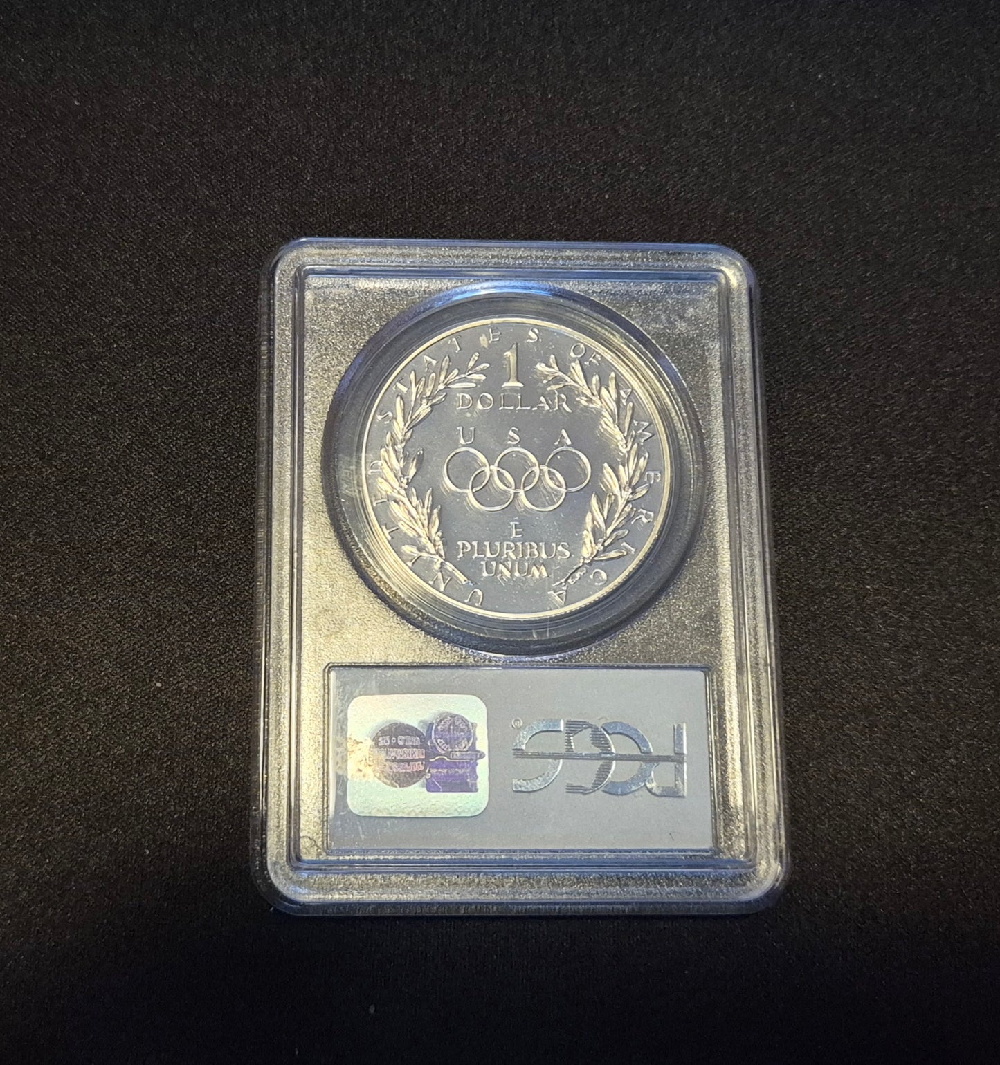 1988-S $1 United States Olympic Commemorative Silver Dollar, graded PR69DCAM image 1