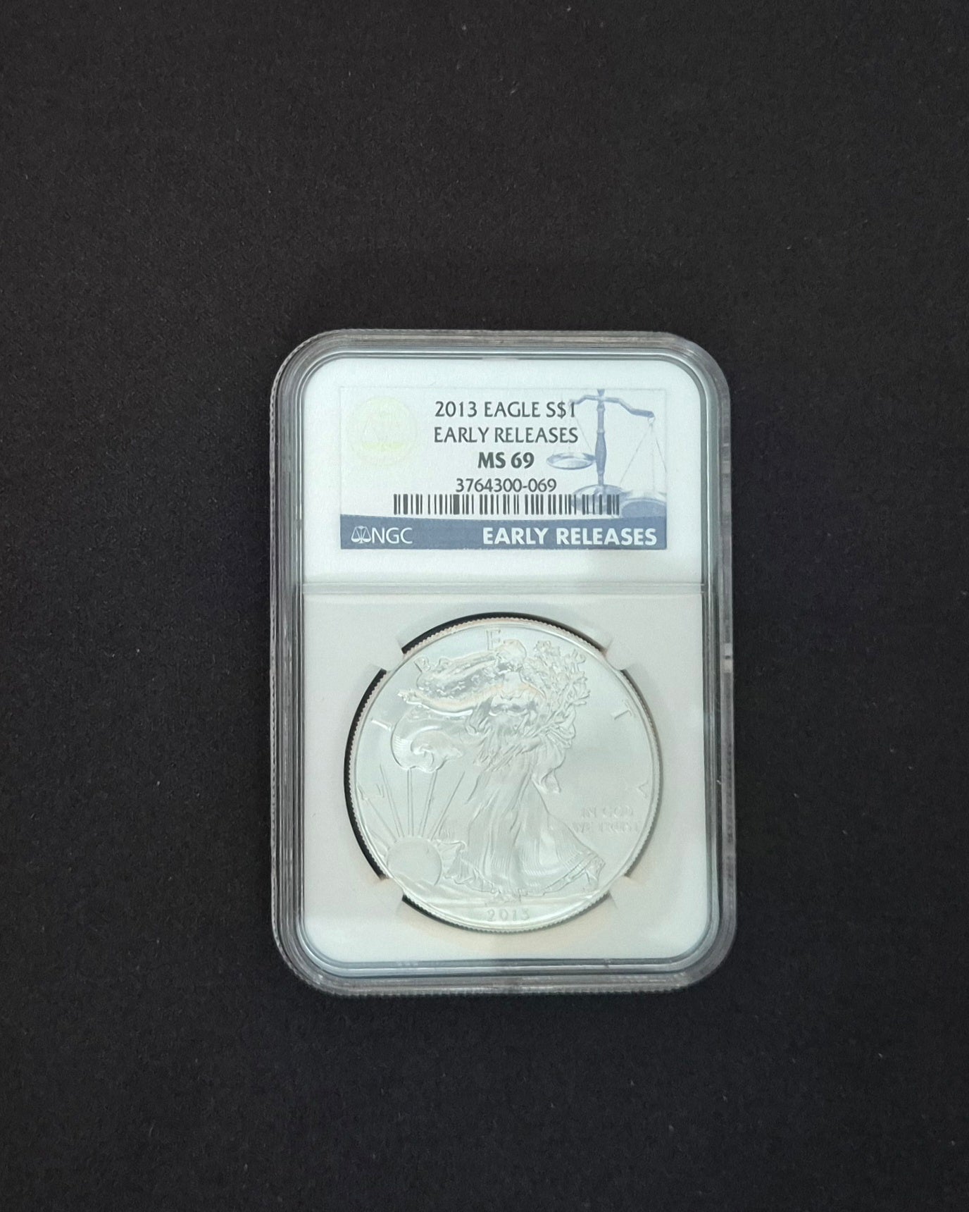2013 American 1 oz Silver Eagle coin, graded MS 69 labeled as "Early Releases. image 0